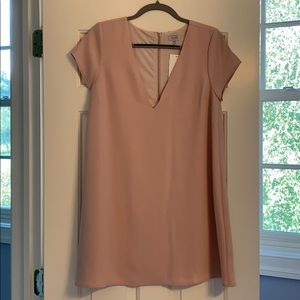 Light pink mini dress with cap sleeves.